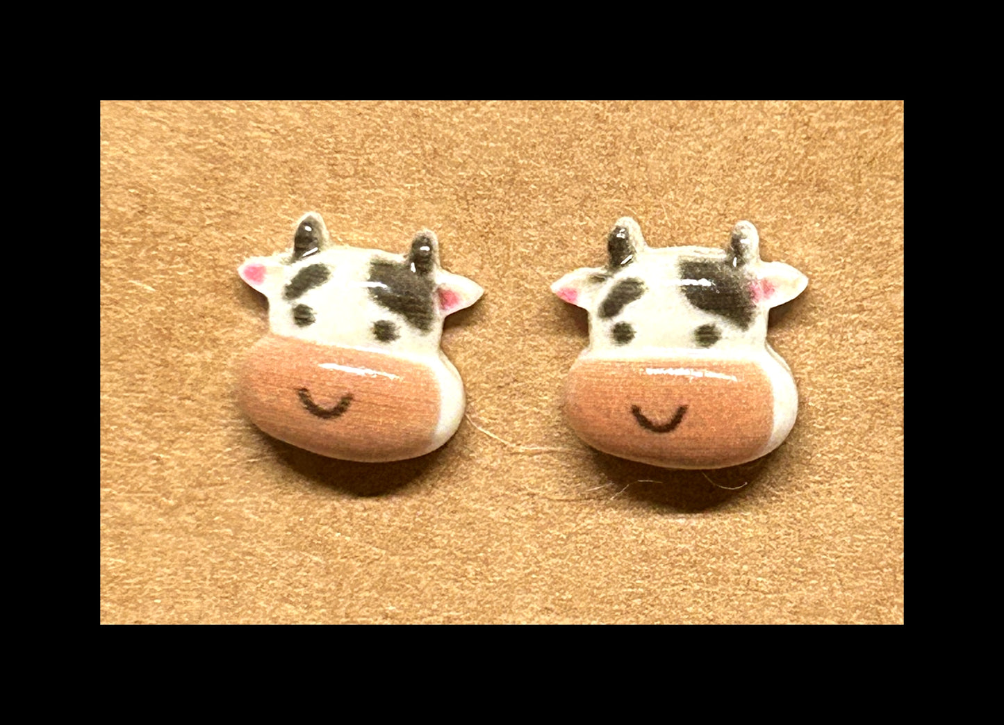 Cow stud earrings