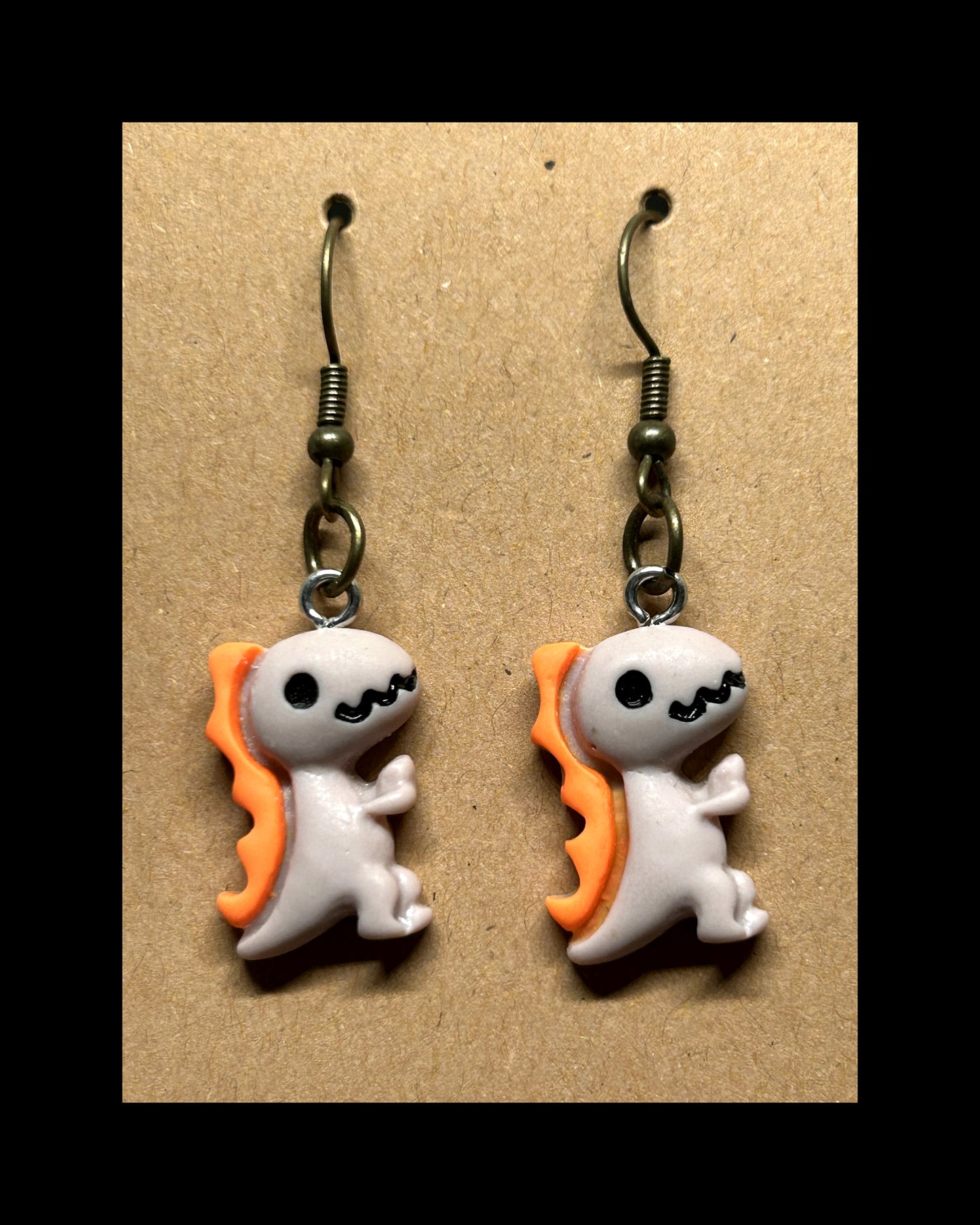 Dino dangle earrings