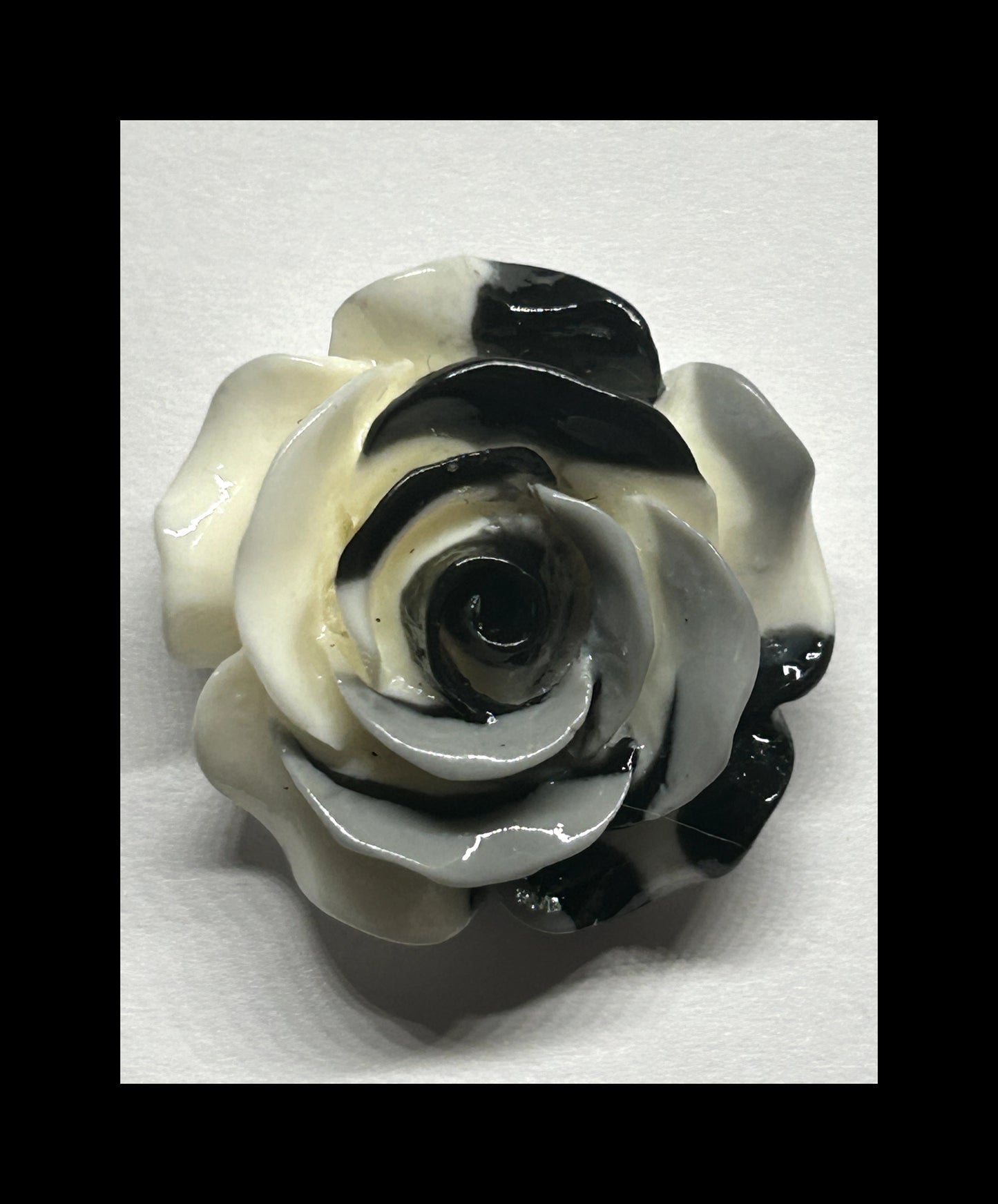 Black and white rose pins