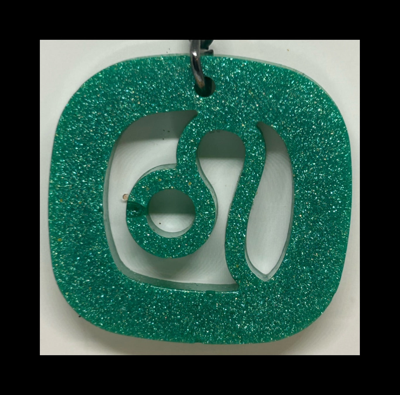 Juniper resin zodiac keychains