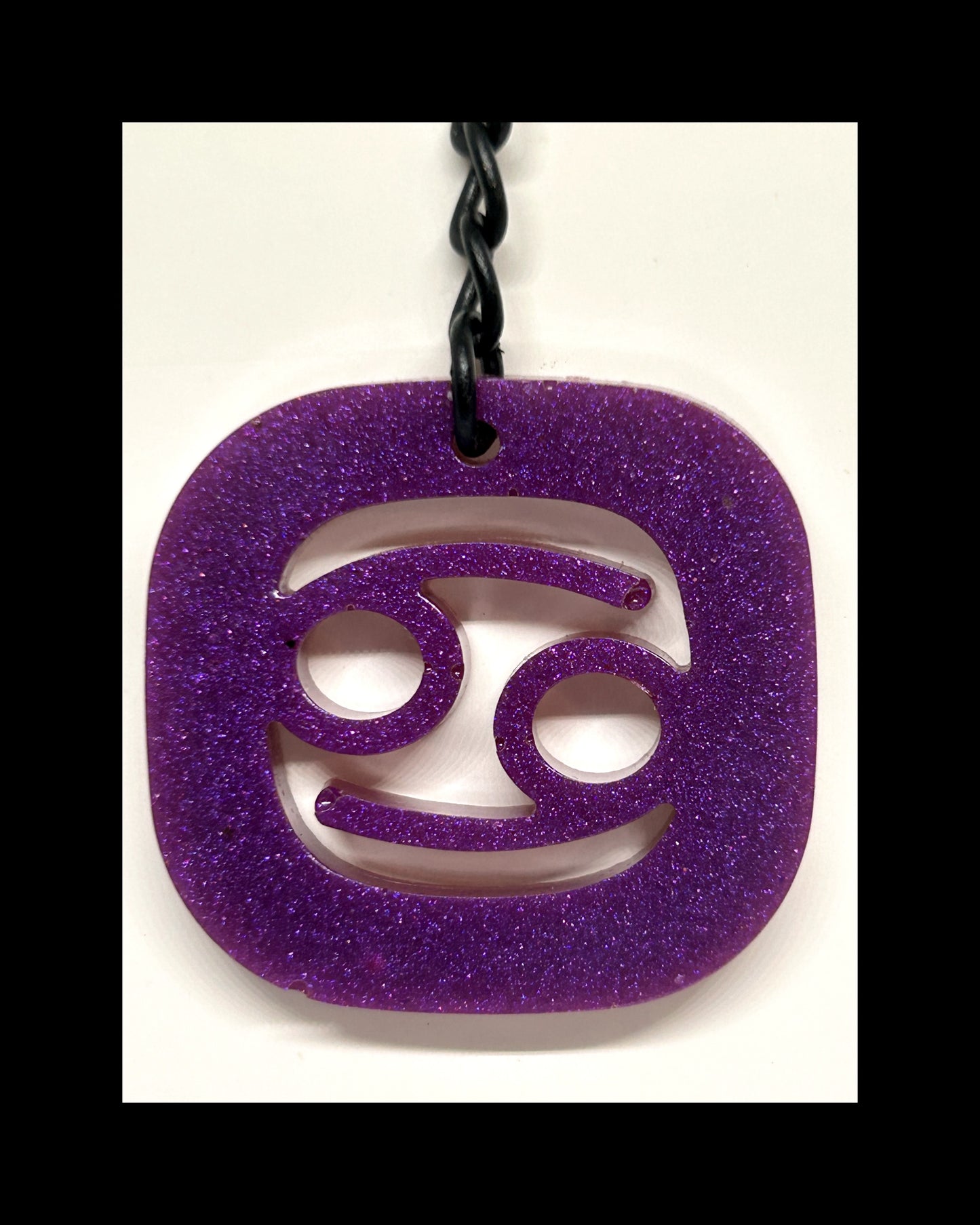 Plum resin zodiac keychains