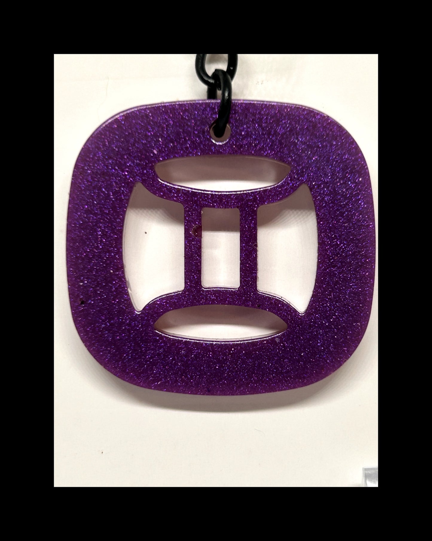 Plum resin zodiac keychains