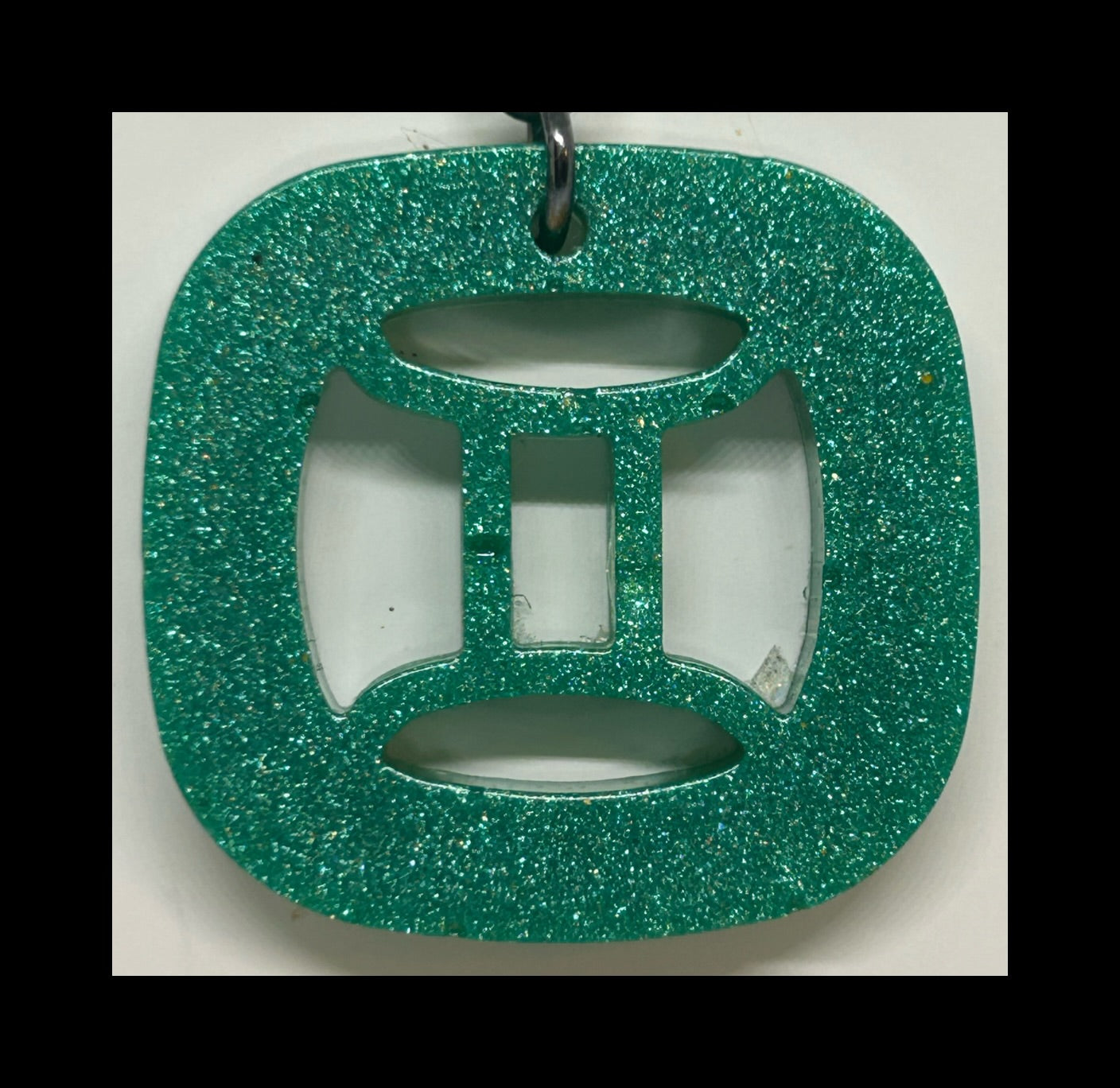 Juniper resin zodiac keychains