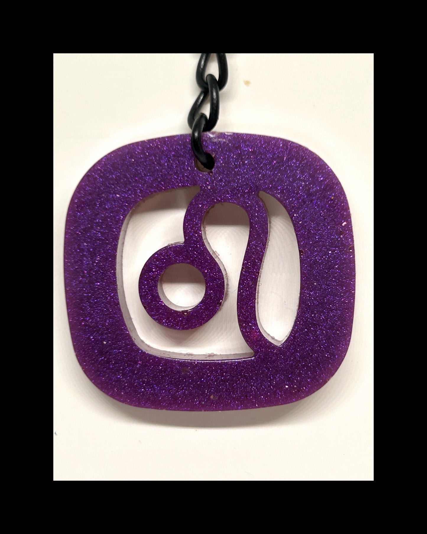 Plum resin zodiac keychains