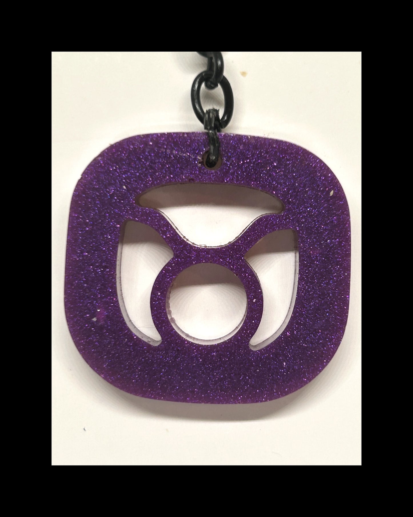 Plum resin zodiac keychains