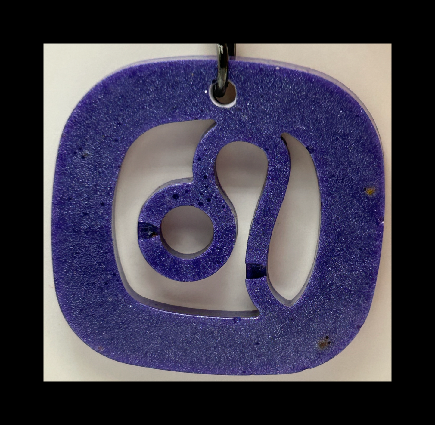 Aubergine resin zodiac keychains