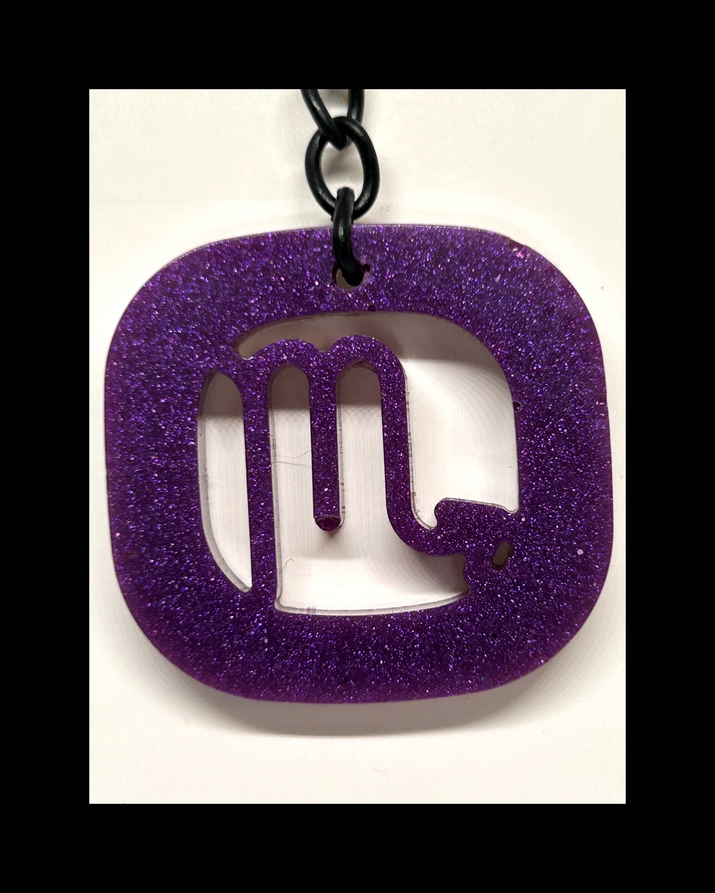 Plum resin zodiac keychains