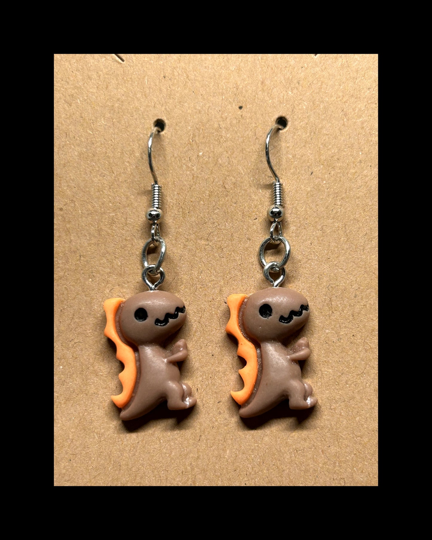 Dino dangle earrings