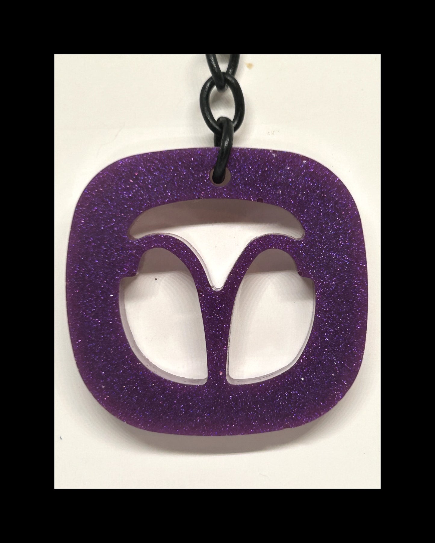 Plum resin zodiac keychains