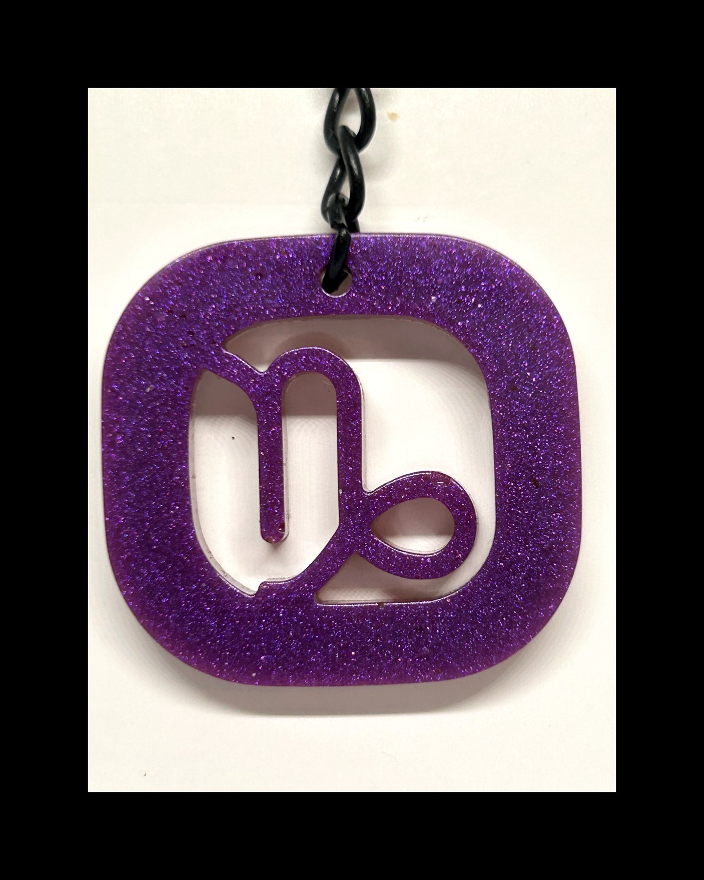 Plum resin zodiac keychains