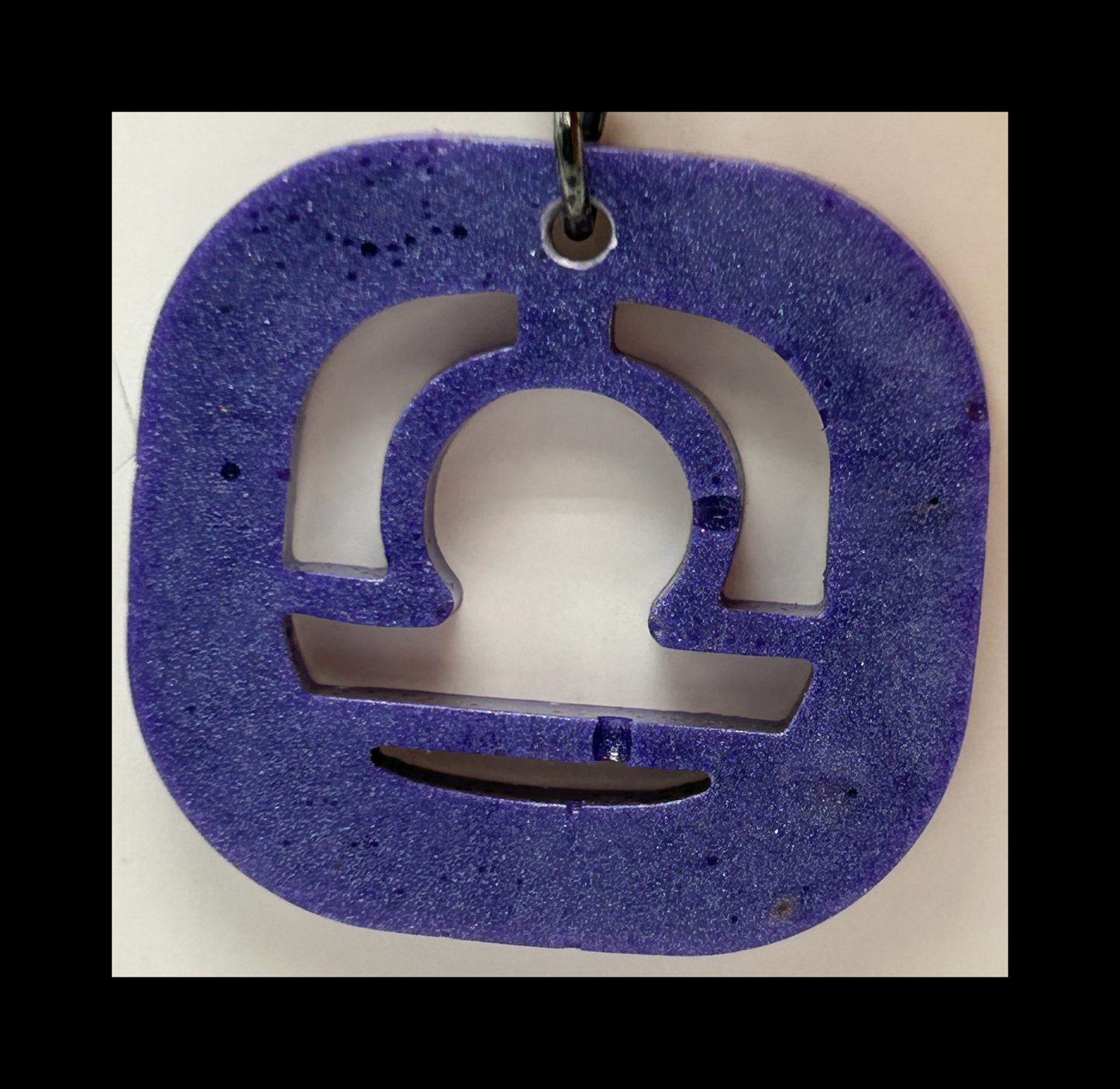 Aubergine resin zodiac keychains