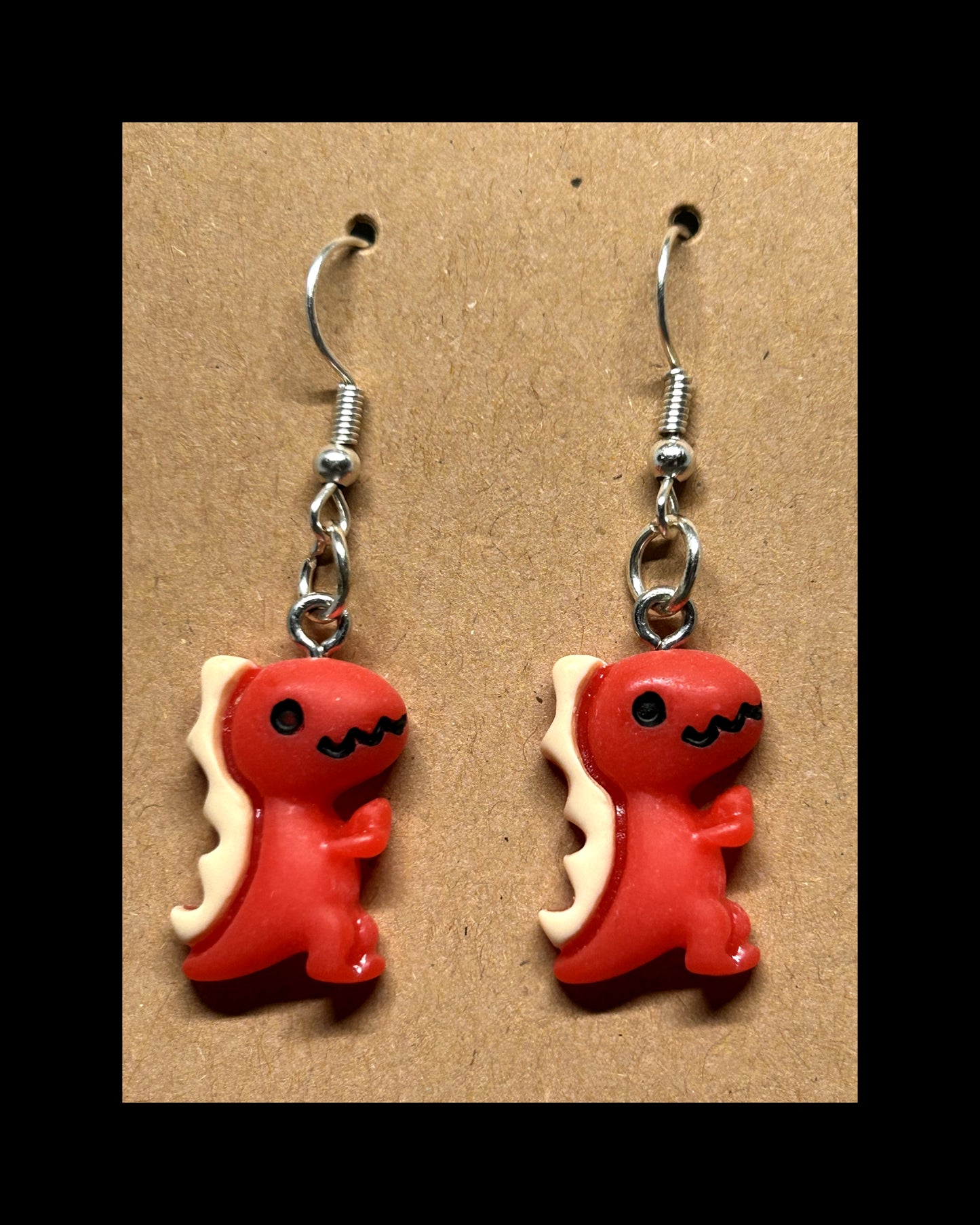 Dino dangle earrings