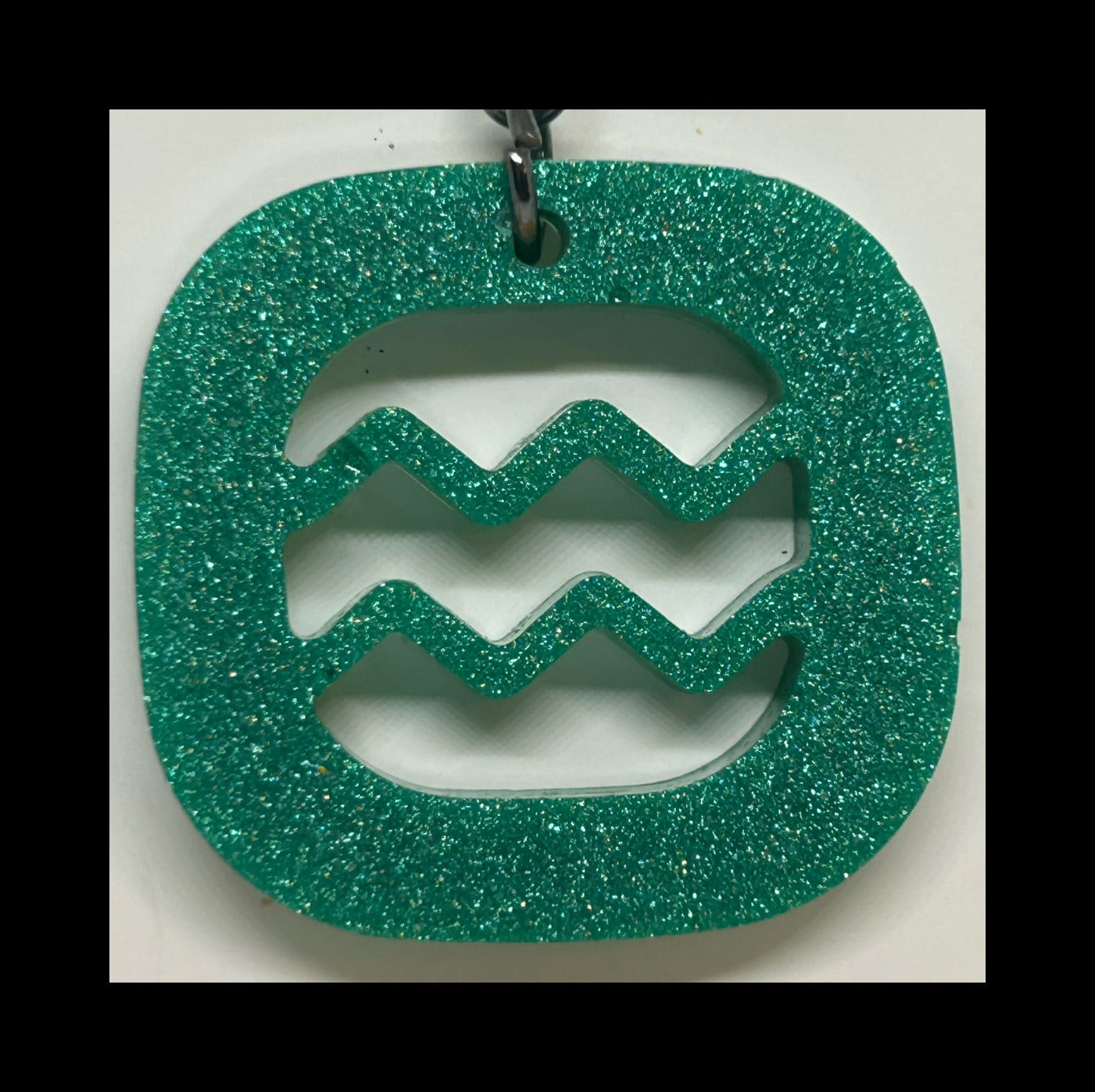 Juniper resin zodiac keychains