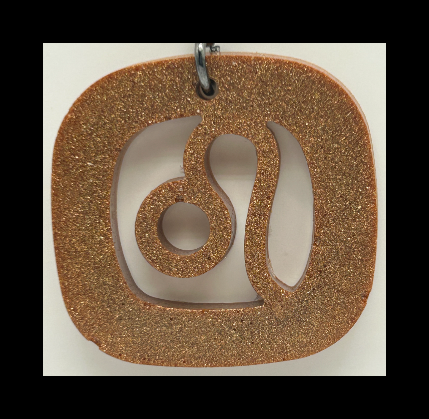 Cognac leather resin zodiac keychains
