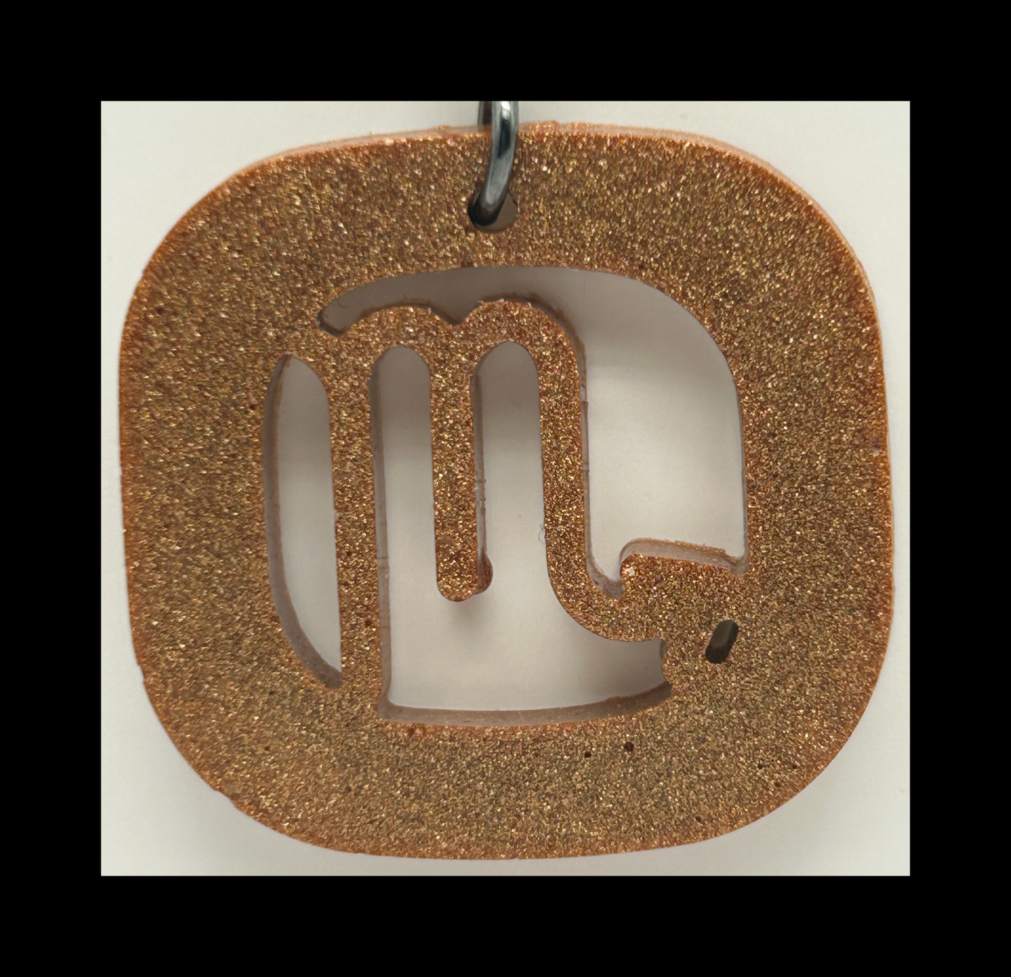 Cognac leather resin zodiac keychains